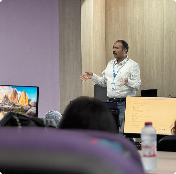 A tutor teaching a class at the IBTE Dubai campus